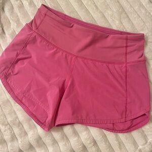 Lululemon midrise speed up shorts pink size 2, 4inch